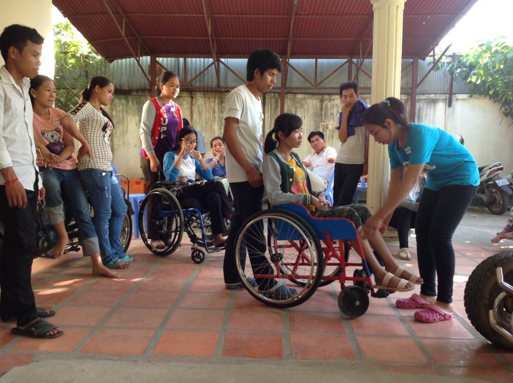 The trainer introduce to how to assist person with disability while sitting on the wheelchair