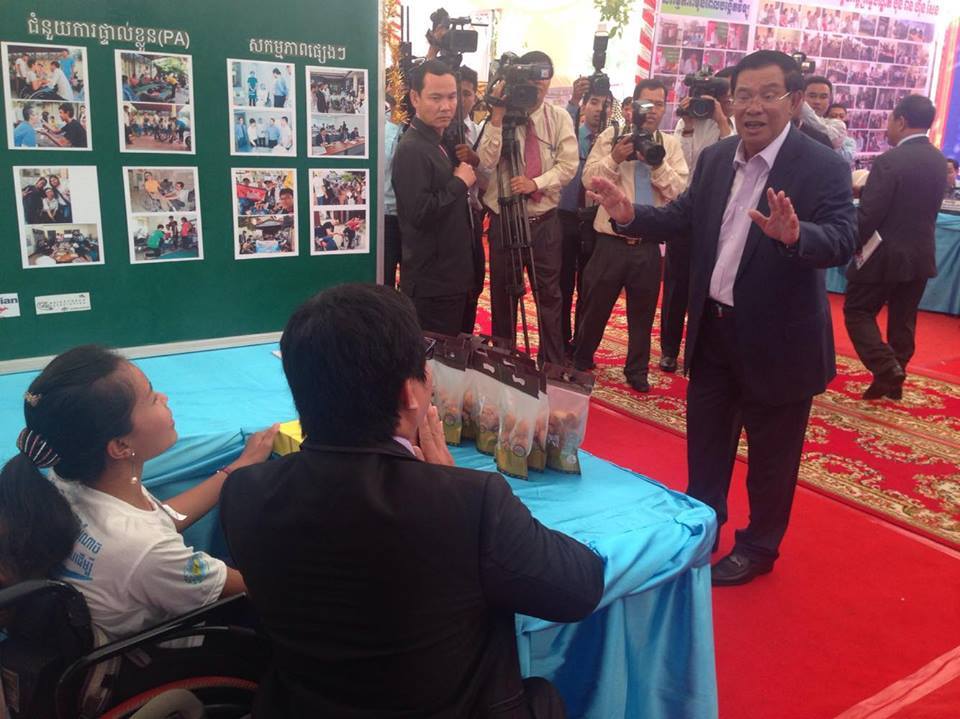 Samith and Bopha were greeting Samdech Techo Prime Minister Hun Sen at exhibition booth